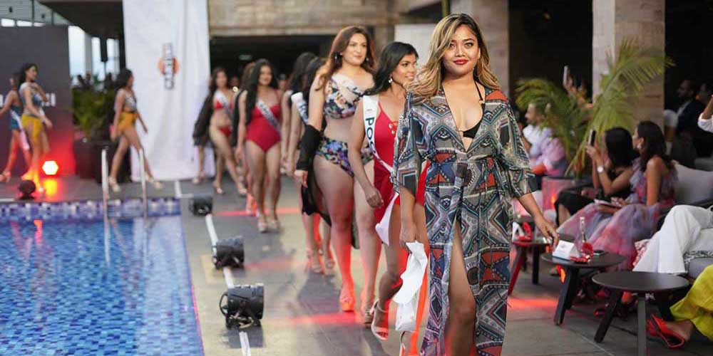 स्विम सुटमा मिस युनिभर्स नेपालका प्रतिस्पर्धीको र्‍यापवाक (तस्बिरहरू) 